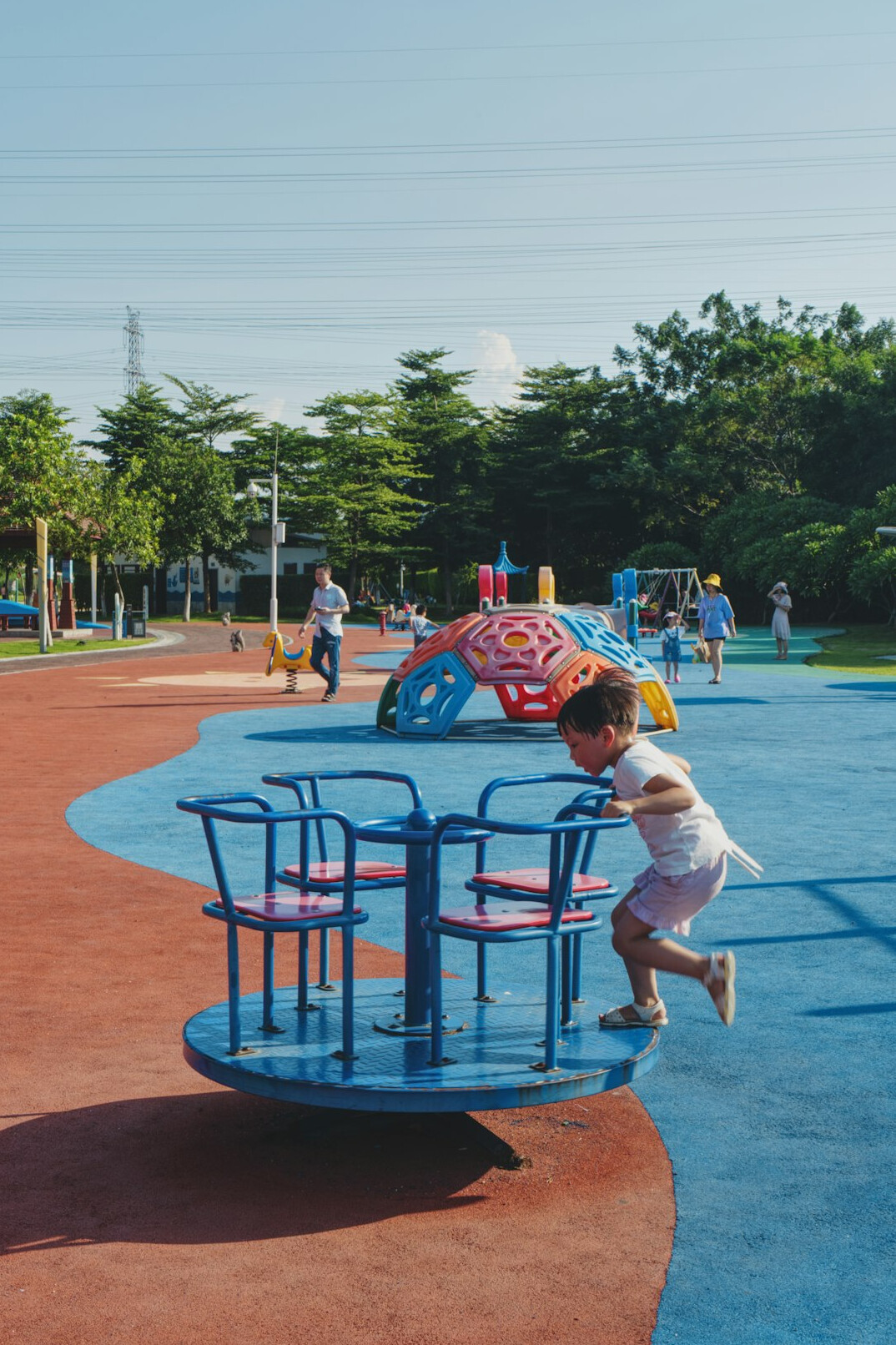 Children playing together at a public playground